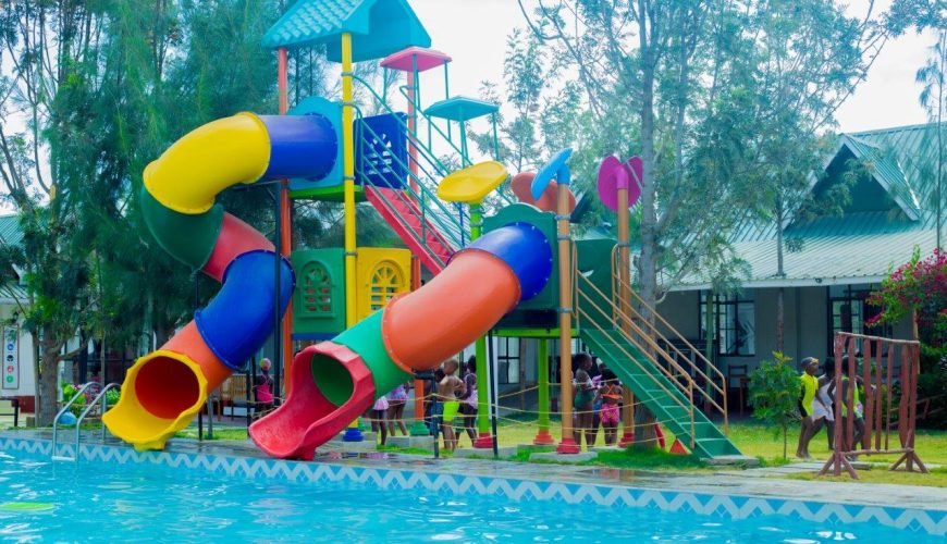 Hotel, Convention & Exhibition Center | large pool 🏊🏿 | Lux Hotel rooms 💤 and green open spaces 🌴🌿 great for group-friendly dining 🥩 All in the warm Savannah ☀